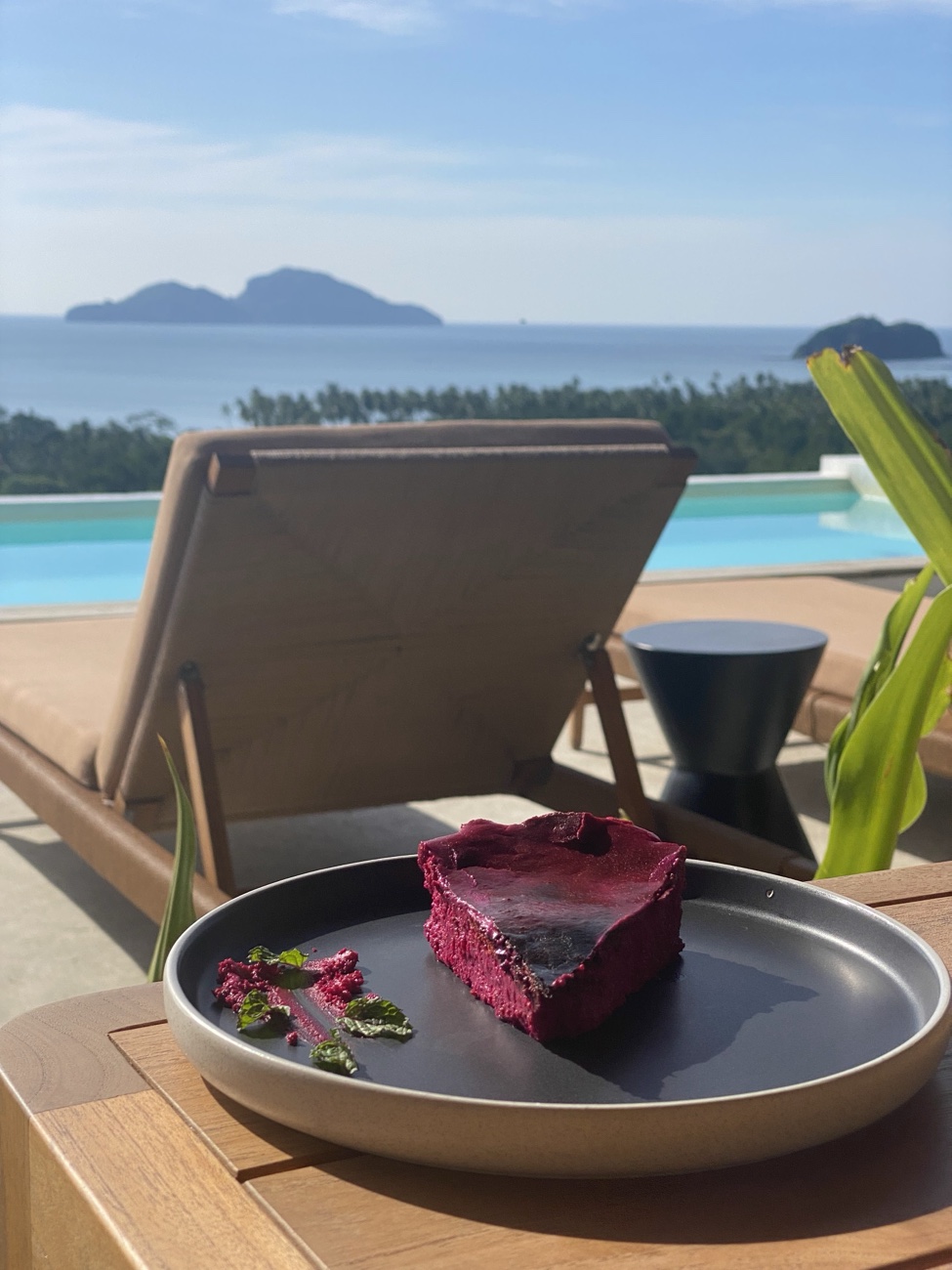 Dragonfruit cheesecake with a view of Bacuit Bay